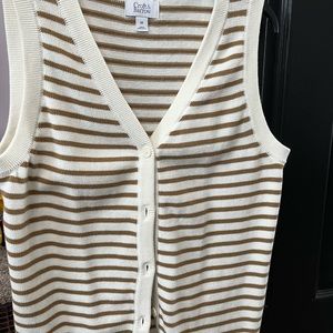 Cute button up vest only wore once!